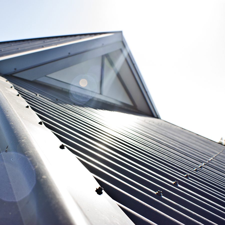 tile to tin roofing project showing a close up of a metal roof in Perth